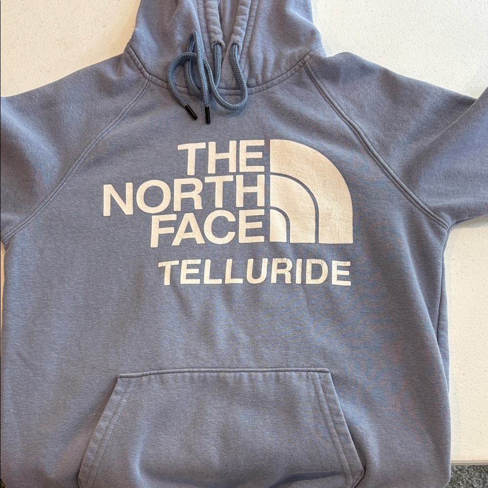 The North Face Blue Hoodie with White Logo